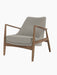 A three-quarter view of The Seal Lounge Chair, Low Back, with a walnut frame and upholstered in a light grey Re-Wool fabric.