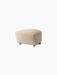 The Tired Man Ottoman in a textured cream fabric, shown at an angle, with dark wooden legs and small brass castors.