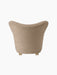 Back view of The Tired Man Lounge Chair in textured beige textile, showing its curved back and short wooden legs.