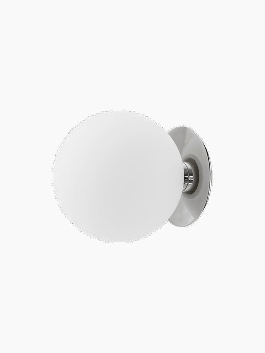 TR Bulb Ceiling/Wall Lamp with a polished steel fixture and a spherical white opal glass shade against a black background.