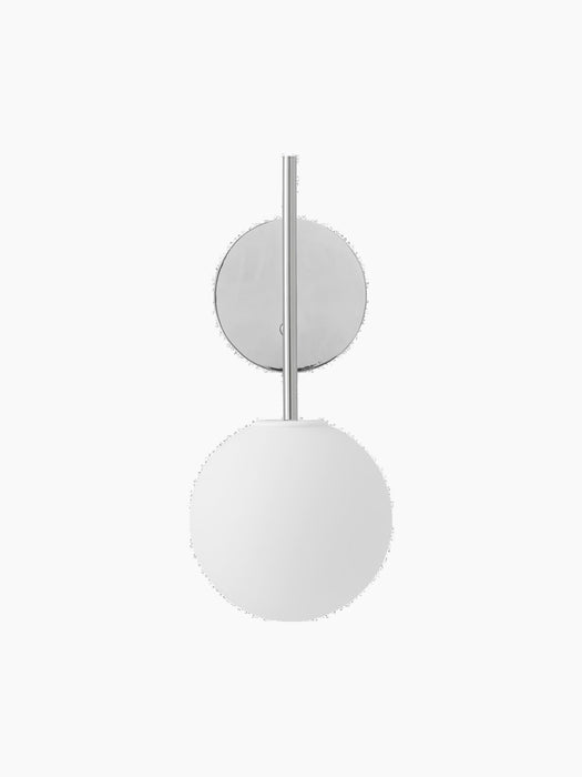 The TR Bulb, Suspended Wall Lamp in polished steel, seen front-on. It has a round backplate and a spherical, opal glass bulb.