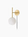 A TR Bulb, Suspended Wall Lamp in brushed brass with a white opal glass globe, shown against a plain black background.