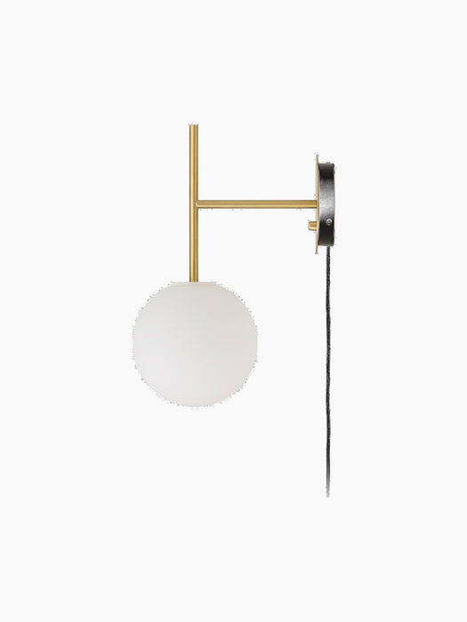Side view of the TR Bulb, Suspended Wall Lamp with a brushed brass frame, white opal glass sphere, and black wall fixture.