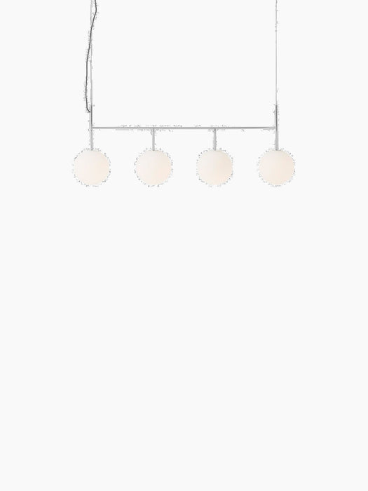 Front view of the TR Bulb, Suspension Frame in polished steel, featuring a linear bar with four spherical opal glass bulbs.