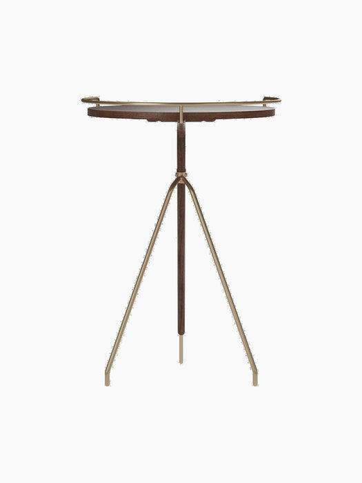 Back view of the tall Umanoff Side Table, featuring a round walnut top with a brushed brass rim and a tripod base.