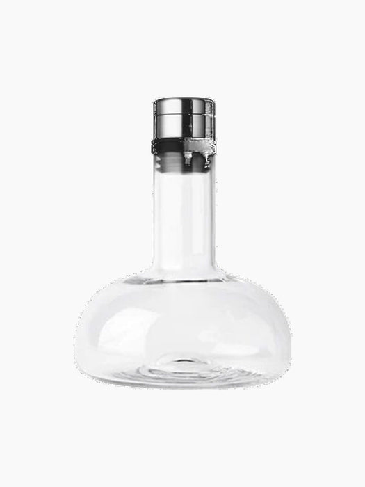 A clear glass Wine Breather carafe with a wide, rounded base, a slim neck, and a stainless steel and black aerating stopper.