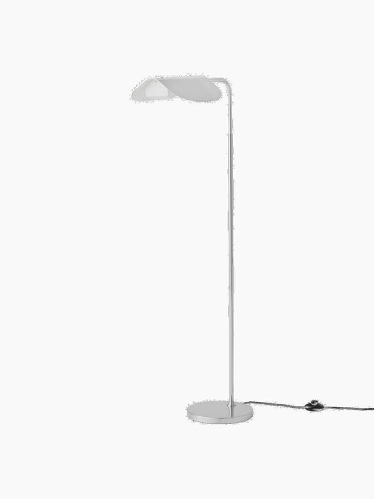 Angled view of the polished aluminium Wing Floor Lamp, off, showing its slim stem, round base, and wing-like shade.