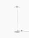 Front view of the Wing Floor Lamp in polished aluminium, with a slim stand, round base, and a wing-shaped shade.