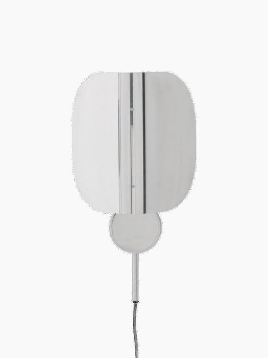 Front view of the Wing Wall Lamp in polished aluminium. The lamp features a folded, reflective shade and is shown turned off.