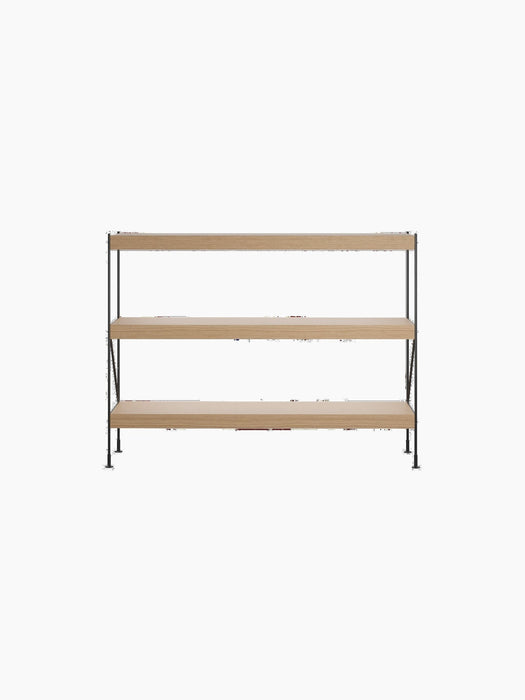 Front view of the Zet Storage System, featuring three natural oak shelves supported by a minimalist black steel frame.