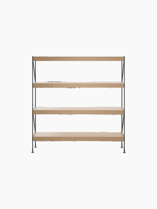 The Zet Storage System, a four-shelf unit in natural oak with a black steel frame and back panel, viewed from the front.