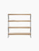 The Zet Storage System, a four-shelf unit in natural oak with a black steel frame and back panel, viewed from the front.