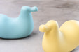 Dodo dodo rocking bird turquoise light yellow - ambient